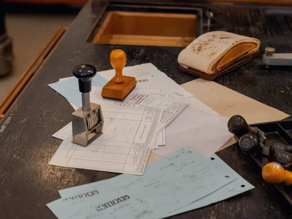 Rubber stamps and documents on a desk