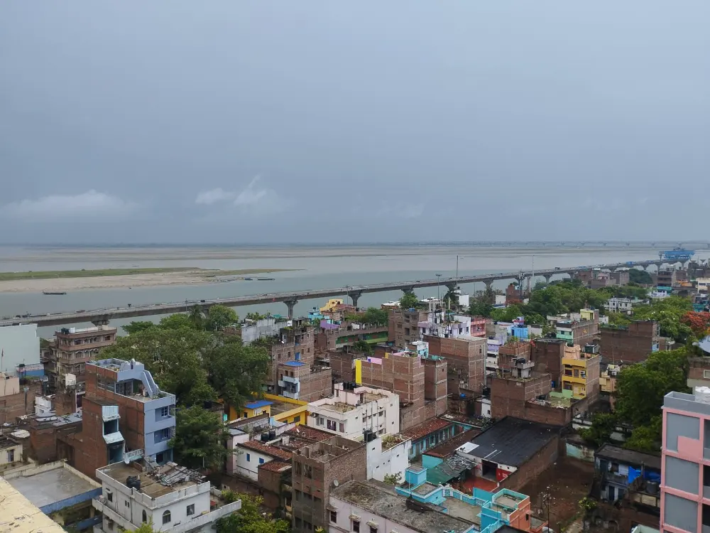 City buildings beside a wide river
