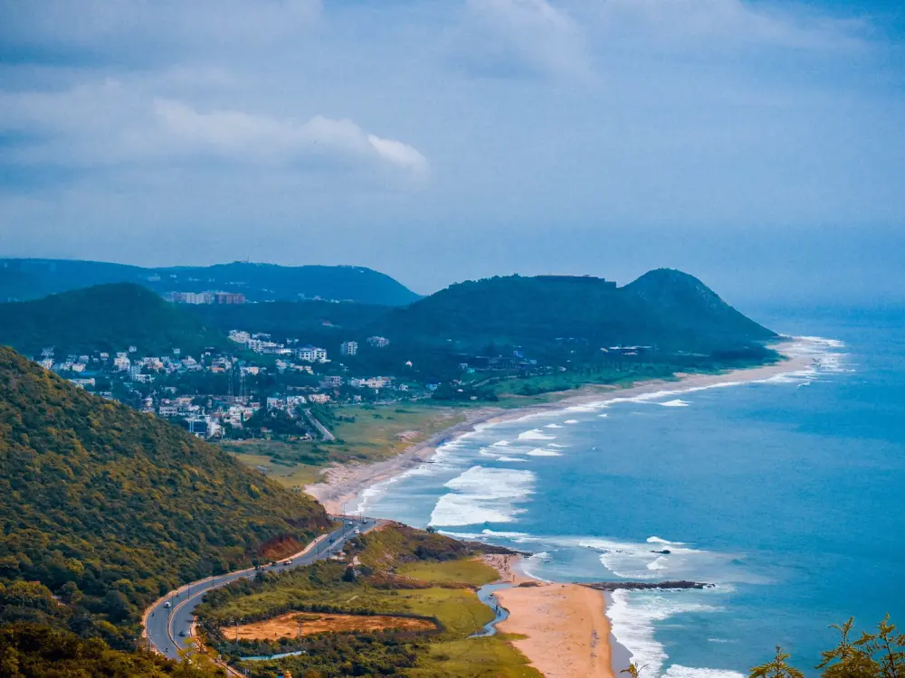 Aerial view of a coastline with hills